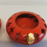 Pair of candle holders from the 1960s-1970s, crafted in red ceramic