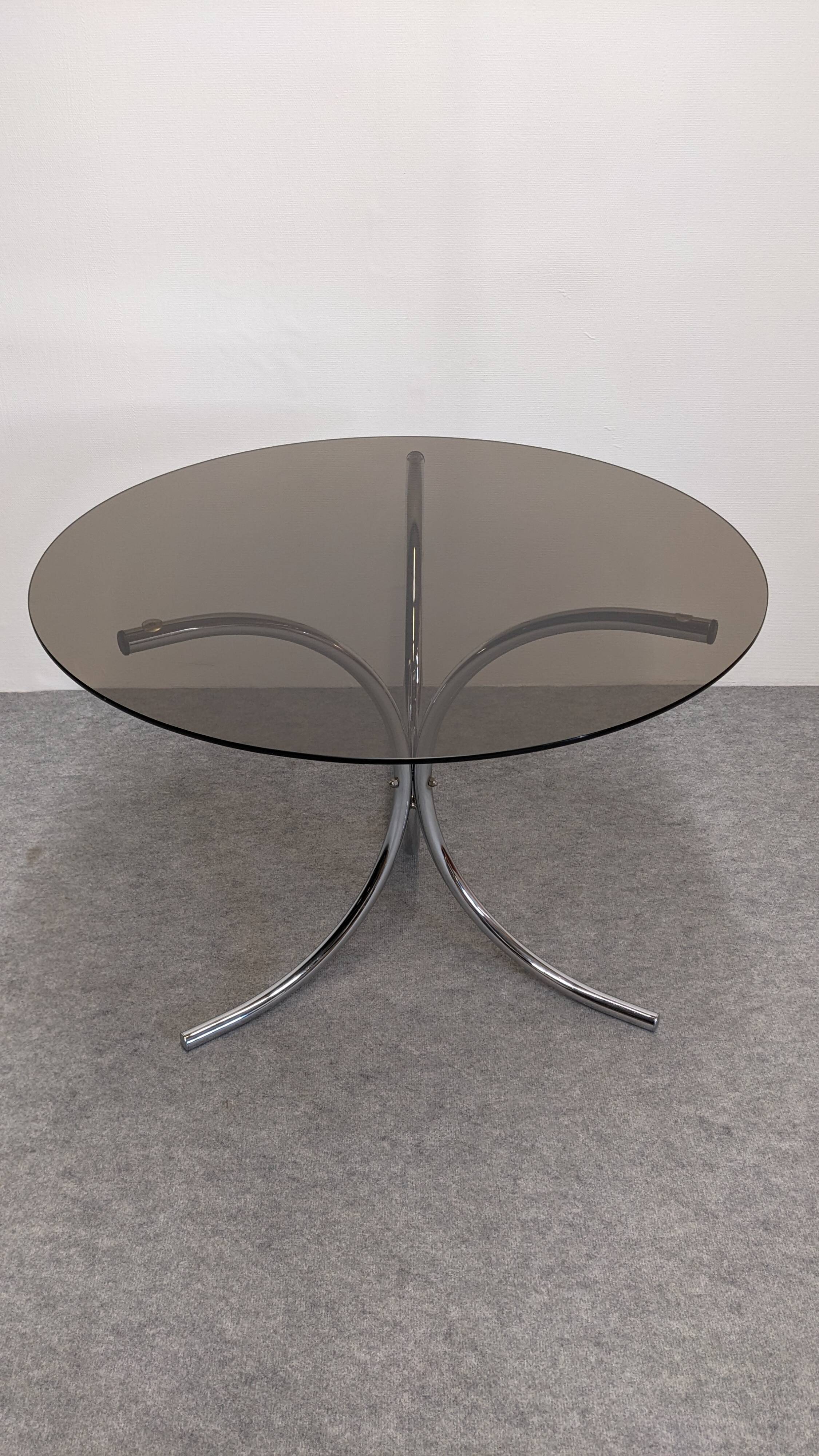 Chrome metal and smoked glass round table, Italy circa 1970.