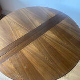 Table with an oak veneer and butterfly extension.
