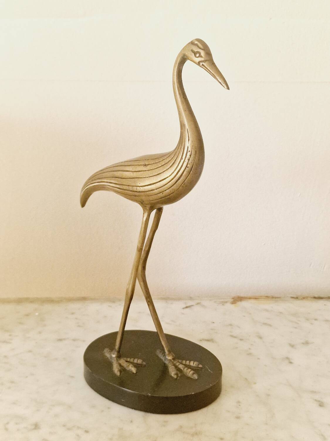 Vintage brass heron statue.
