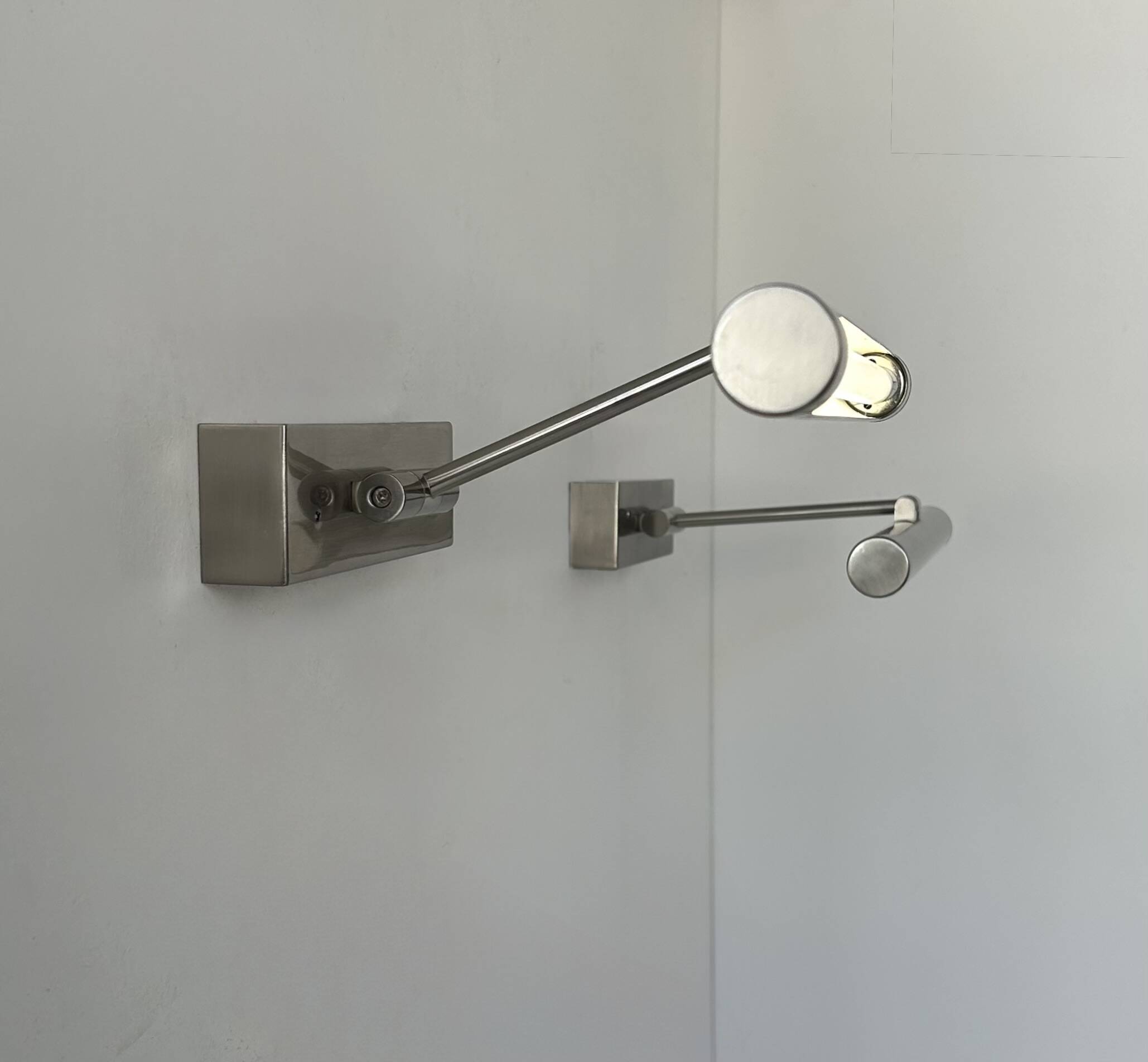 Pair of vintage chrome adjustable wall lights, France, 1980