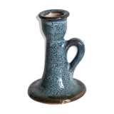 Antique candle holder in glazed ceramic