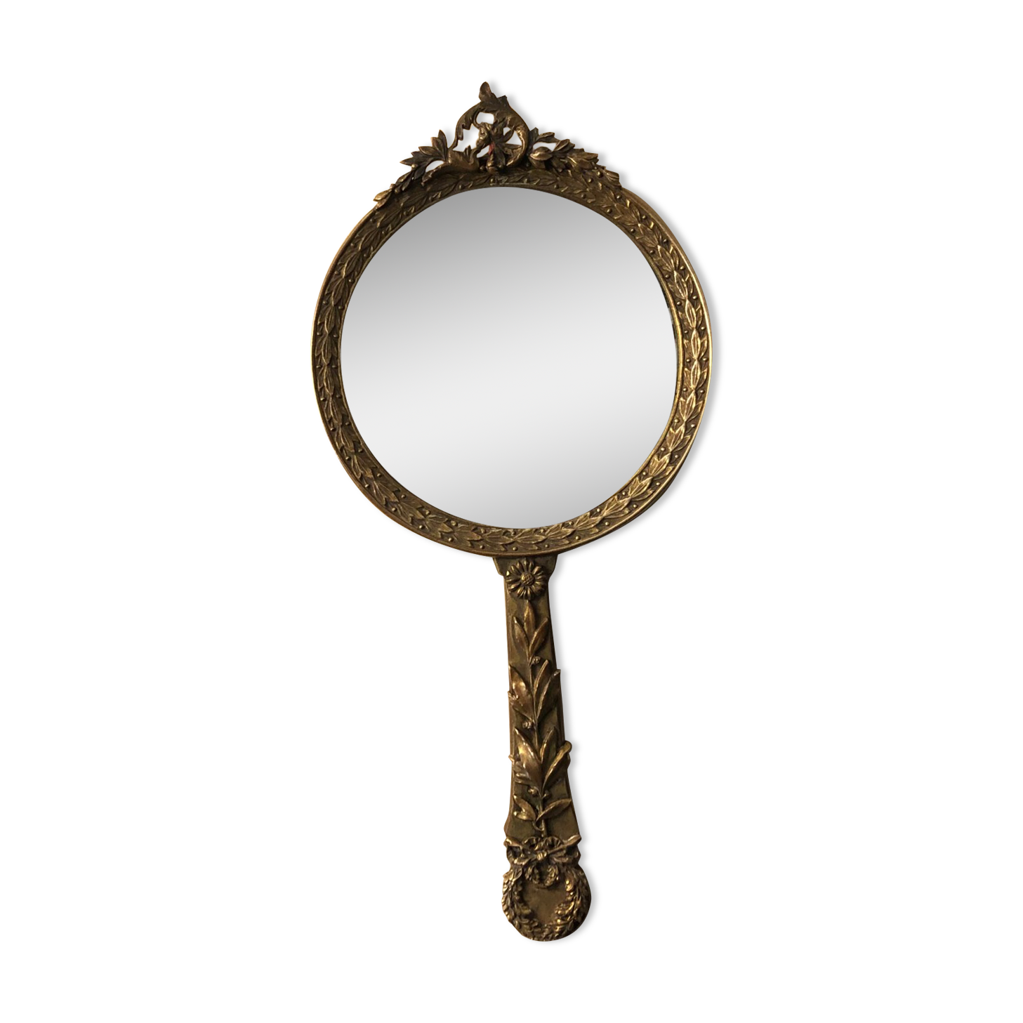 Hand mirror in gilded bronze