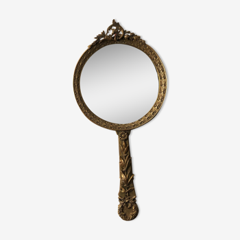 Hand mirror in gilded bronze