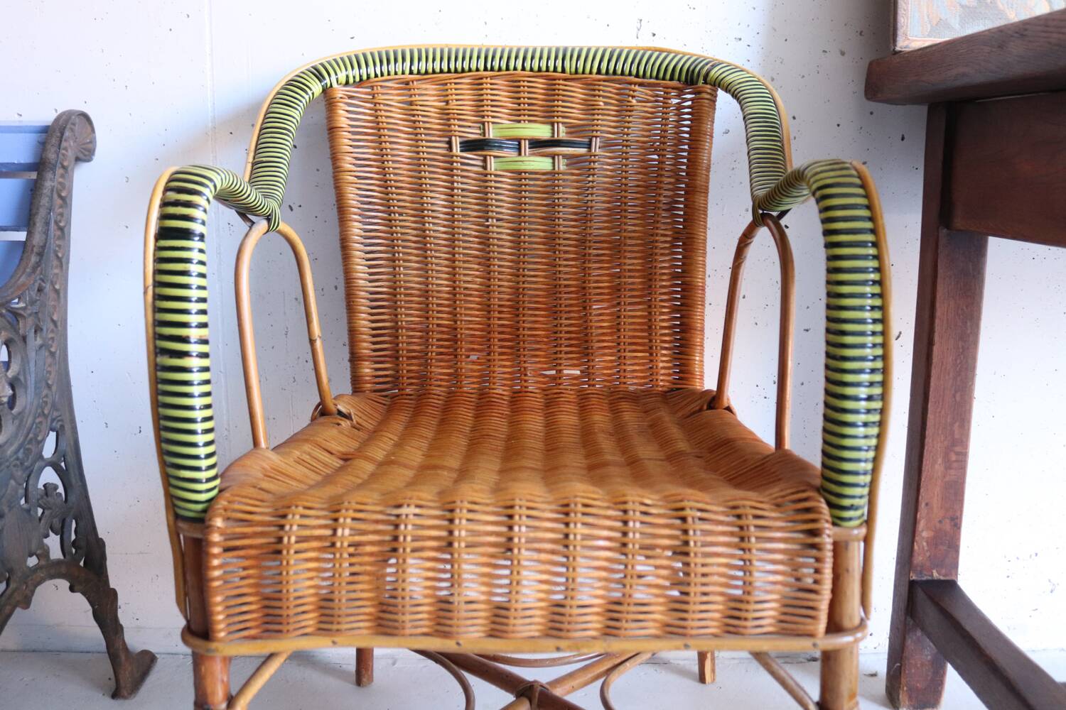 Antique two-tone rattan armchair
