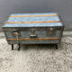 Old zinc trunk with legs, industrial console
