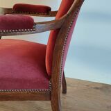 Red voltaire armchair