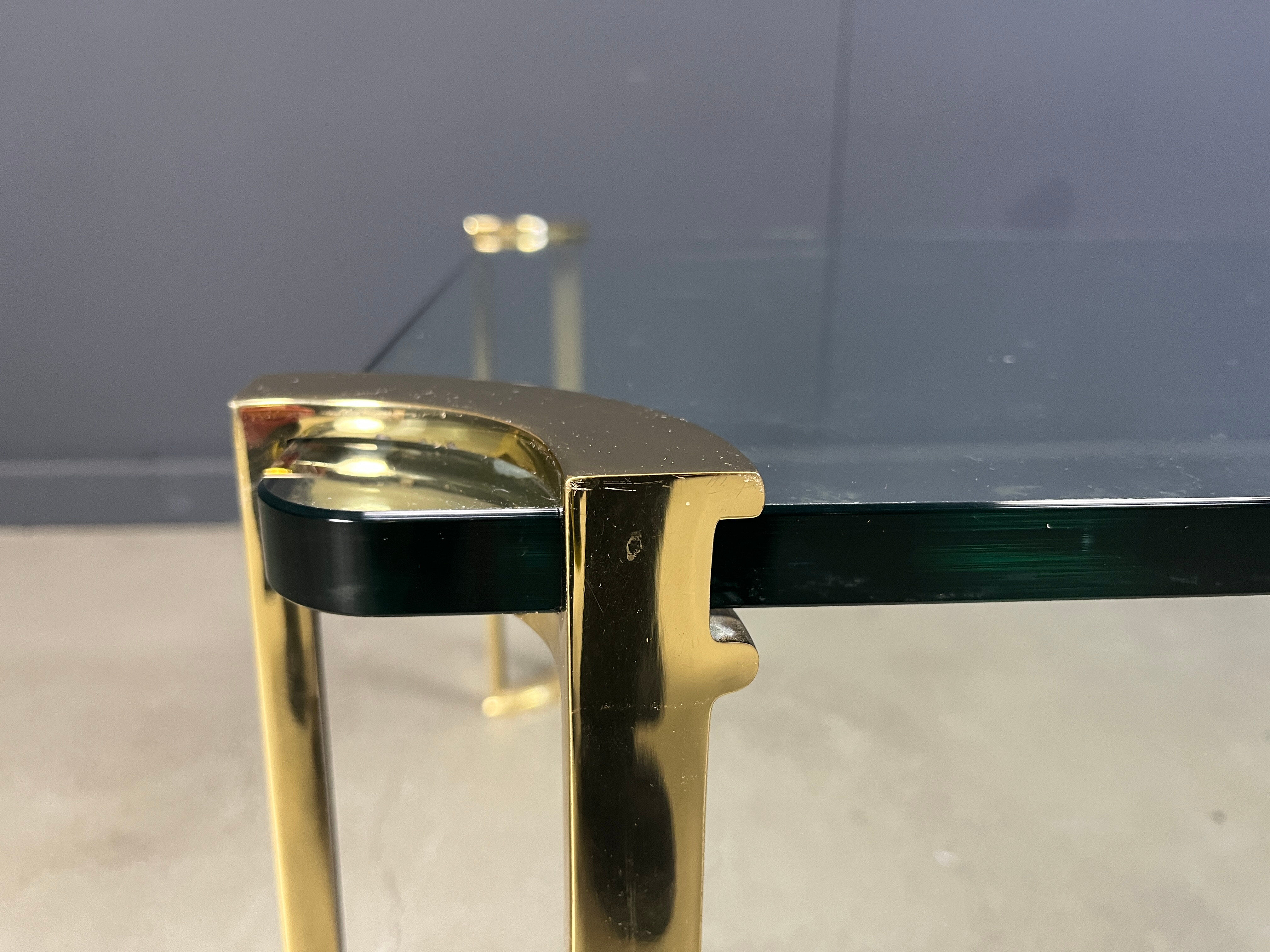 Peter Ghyczy style coffee table in brass and glass