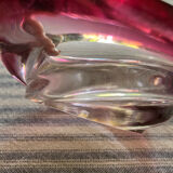 Empty pocket in pink tinted glass