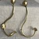 Pair of ball and hook coat hooks in brass