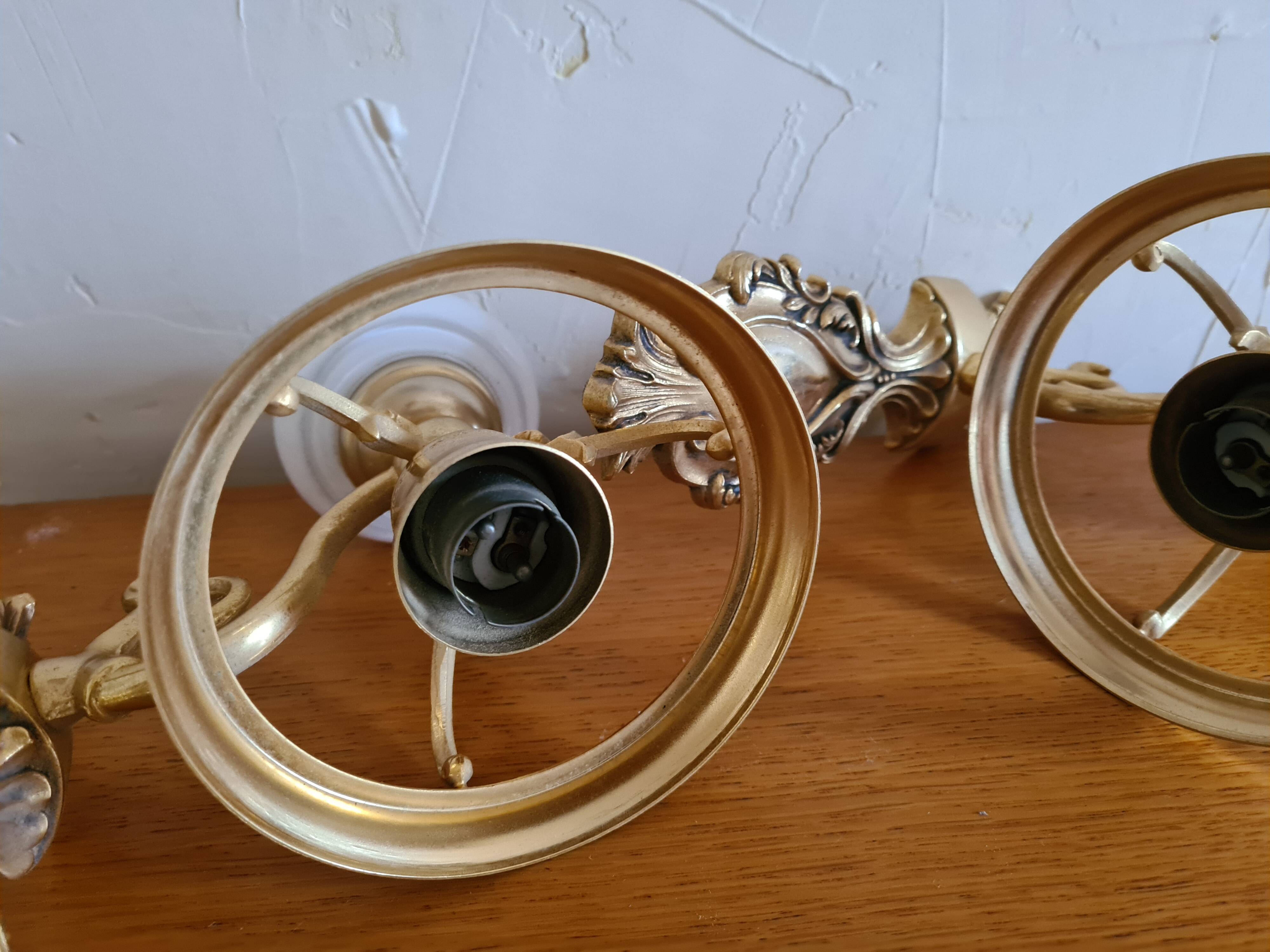 Pair of opaline and gilded brass wall lights