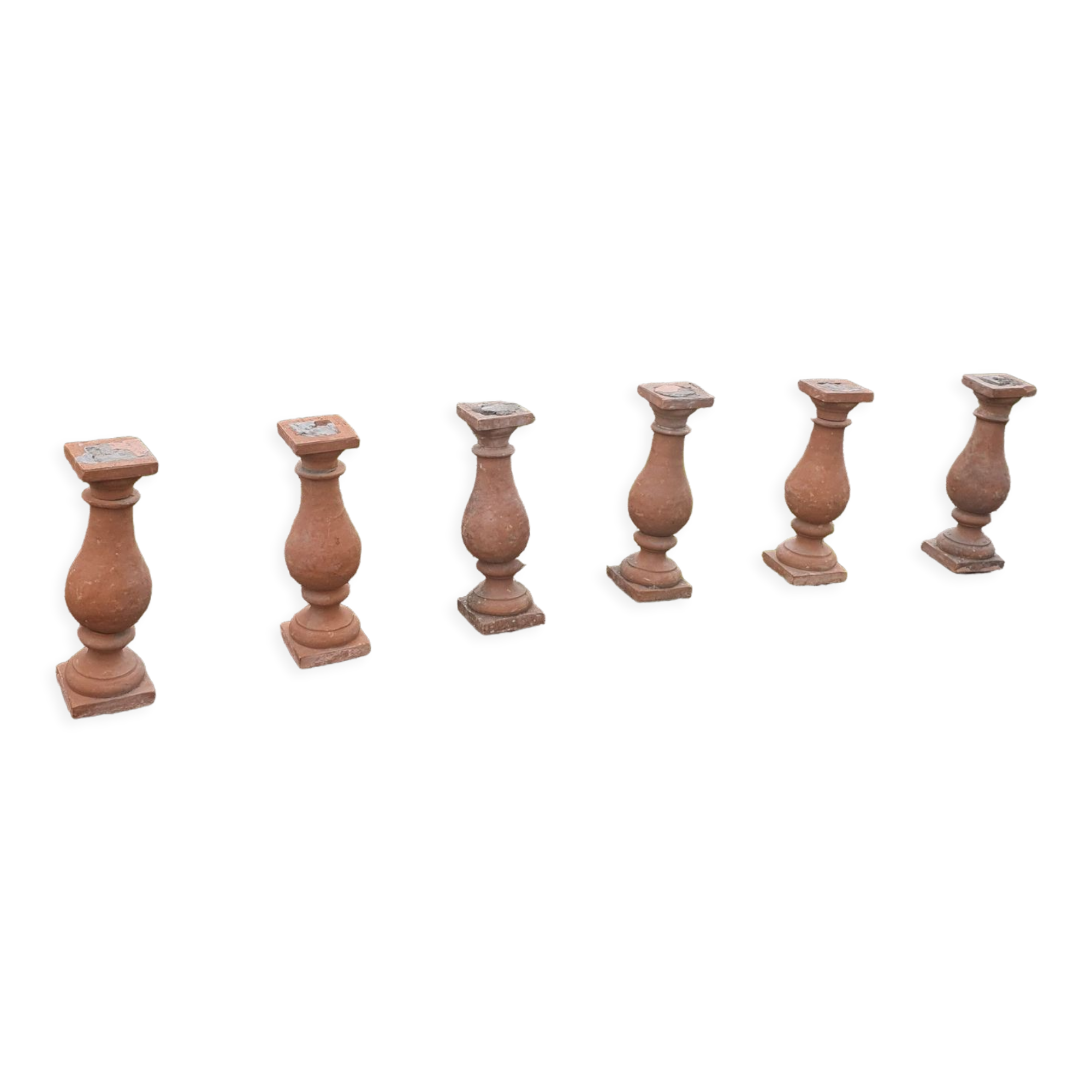 About twenty terracotta balusters from Castelnaudary