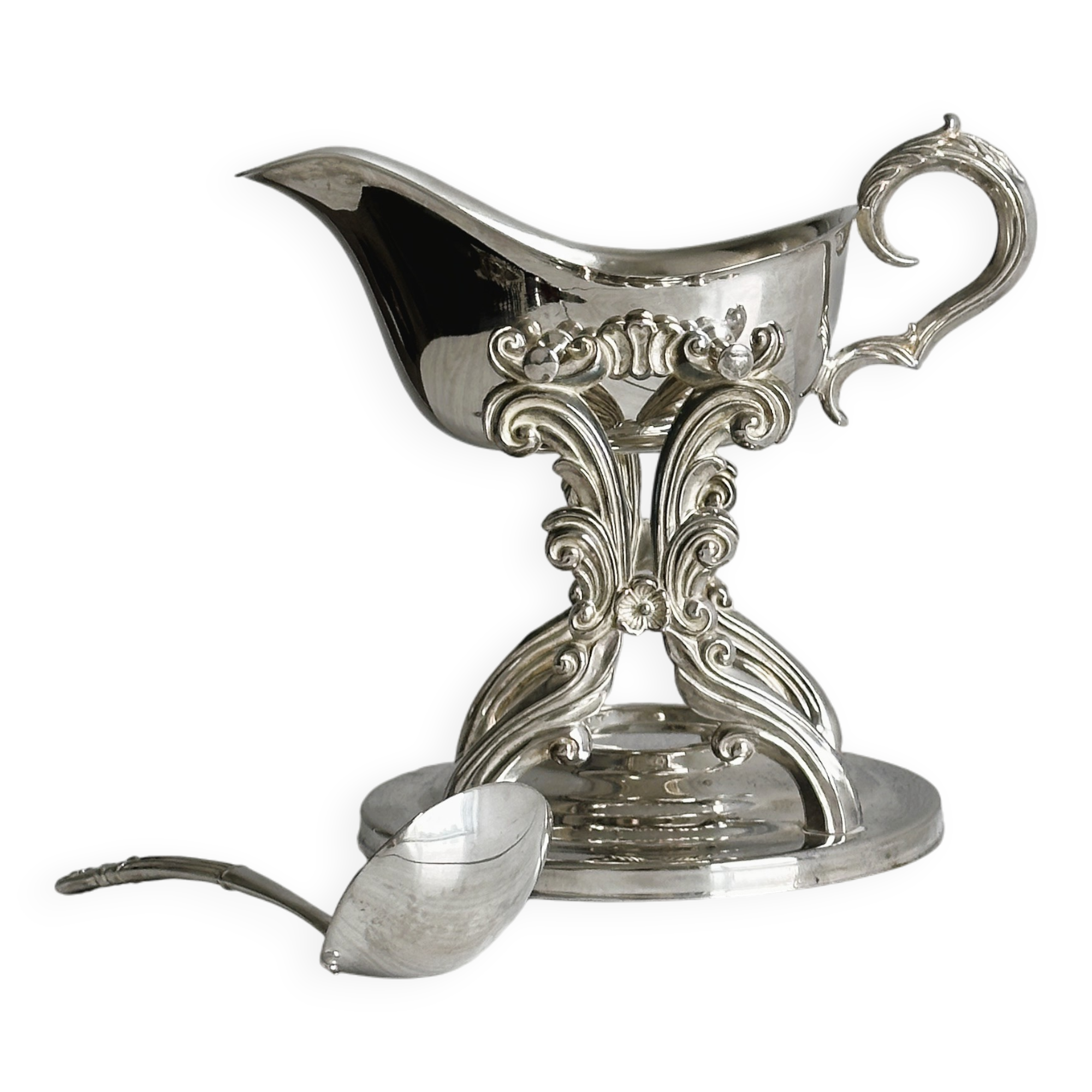 antique metal sauceboat with candle warmer and ladle