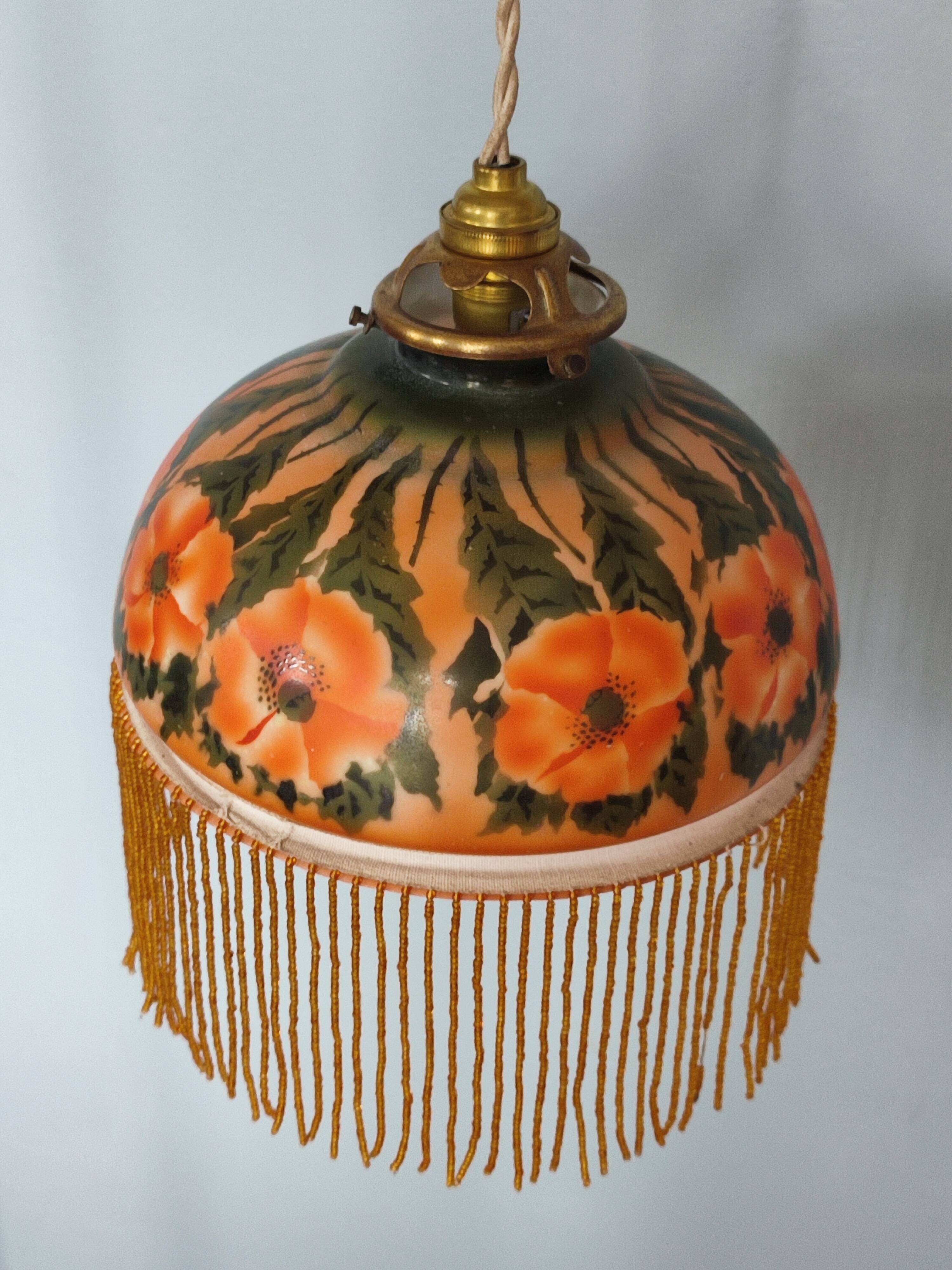 Old opaline and its tassels hanging lamp
