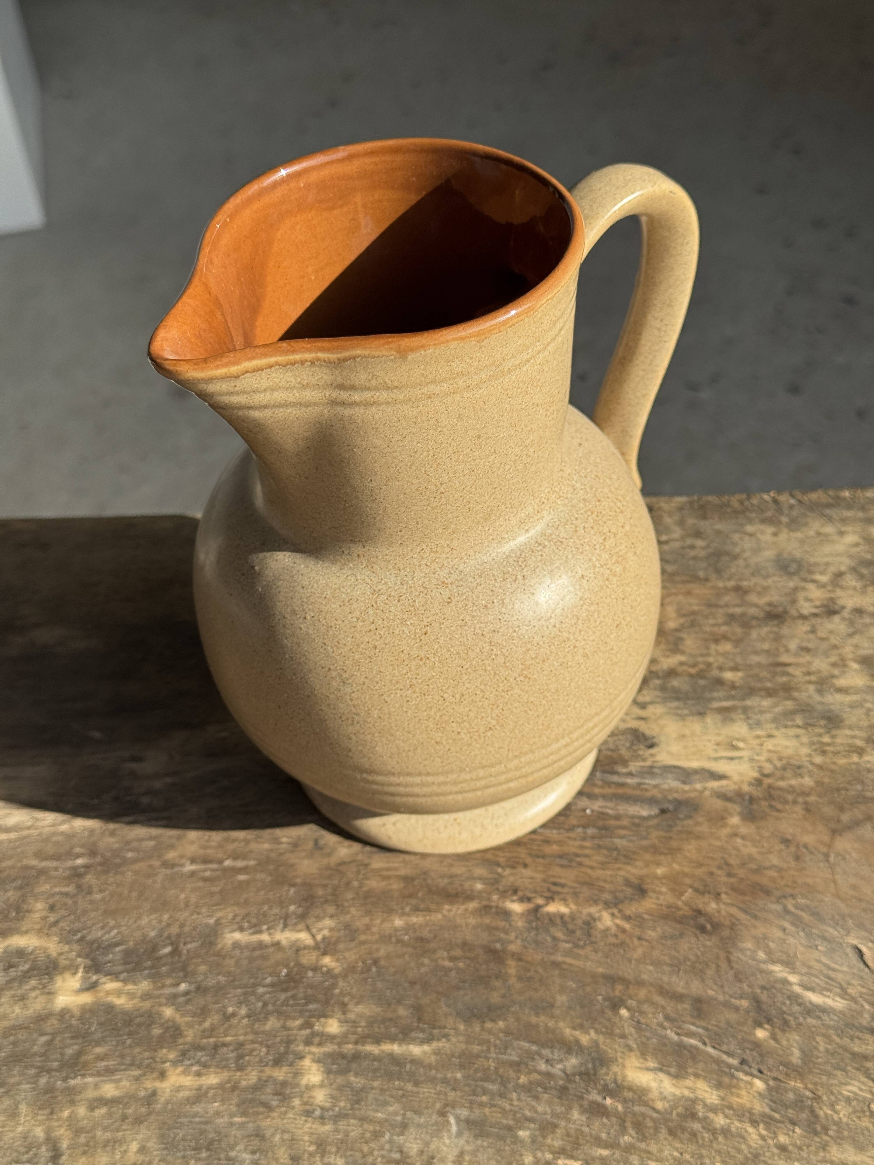 Vintage stoneware round carafe