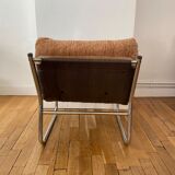 Beige and chrome armchair