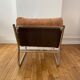 Beige and chrome armchair