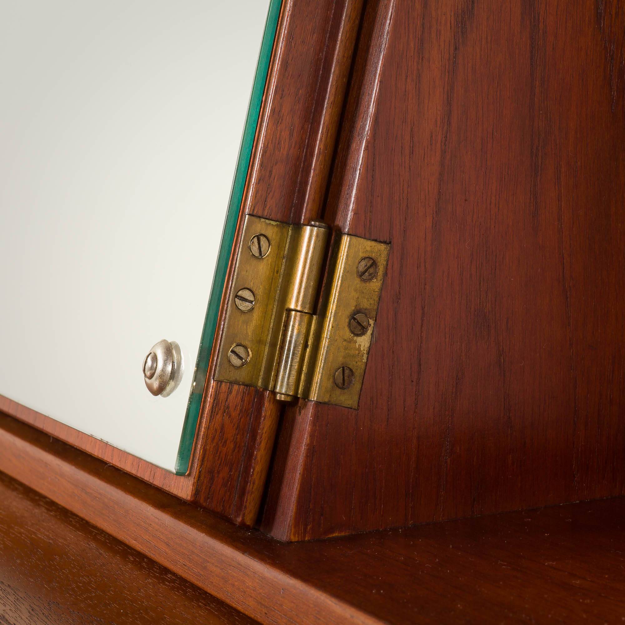 Danish  mid century teak  bureau with a hidden vanity by Ølholm Møbelfabrik