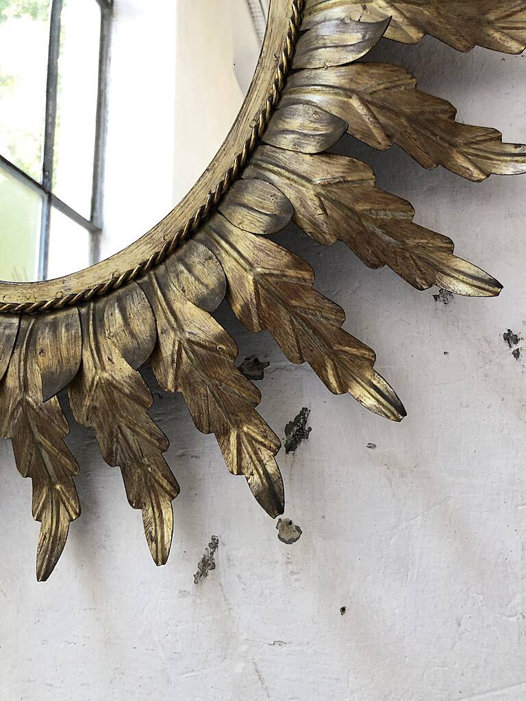 Old flowered sun golden mirror