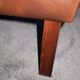 Fauteuil en cuir et bois de rose, années 1960
