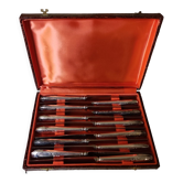Coffret de 12 couteaux en métal argenté