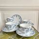 5 coffee cups with blue flower decor from the 70s