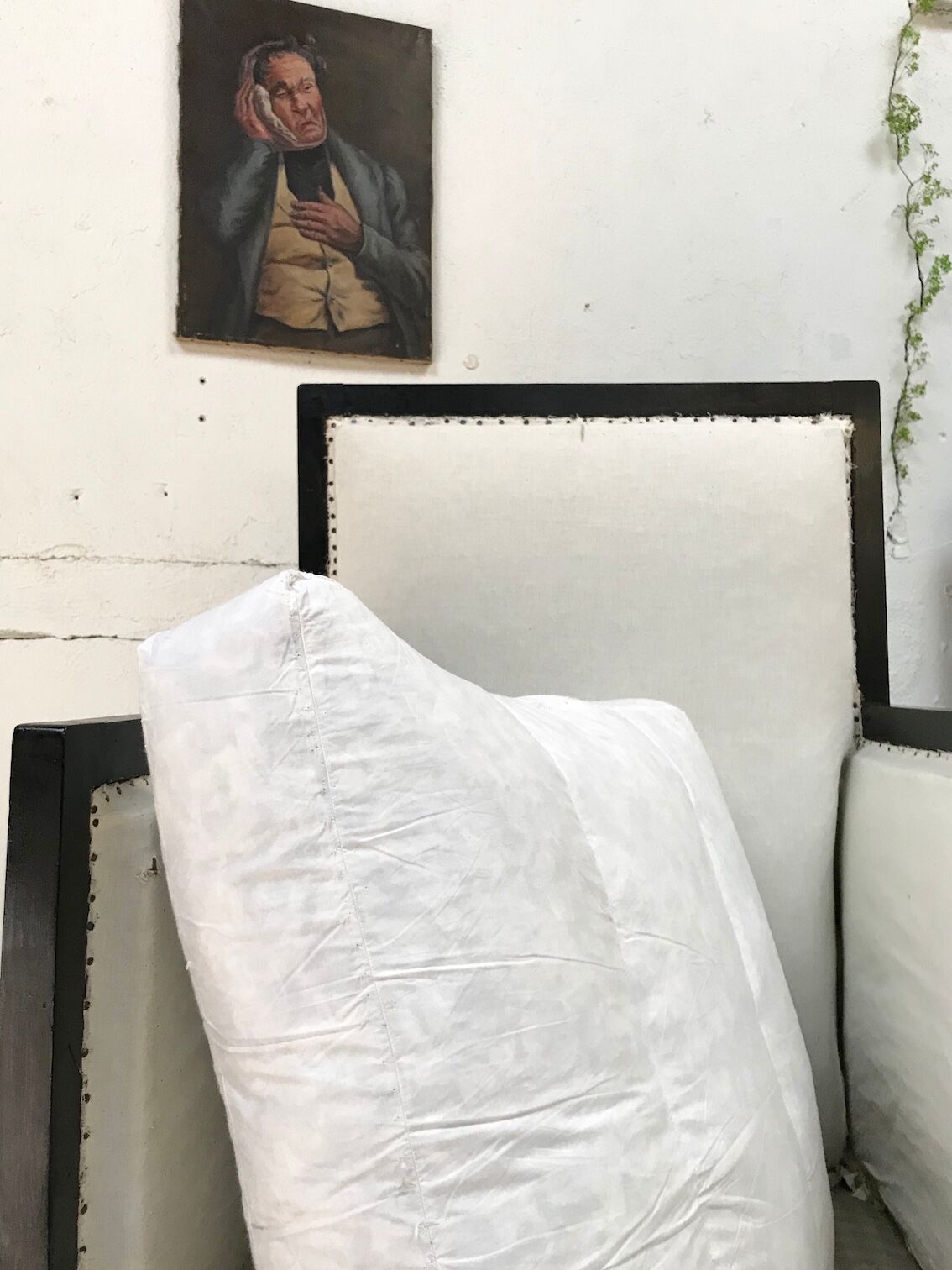 Pair of blackened wooden armchairs