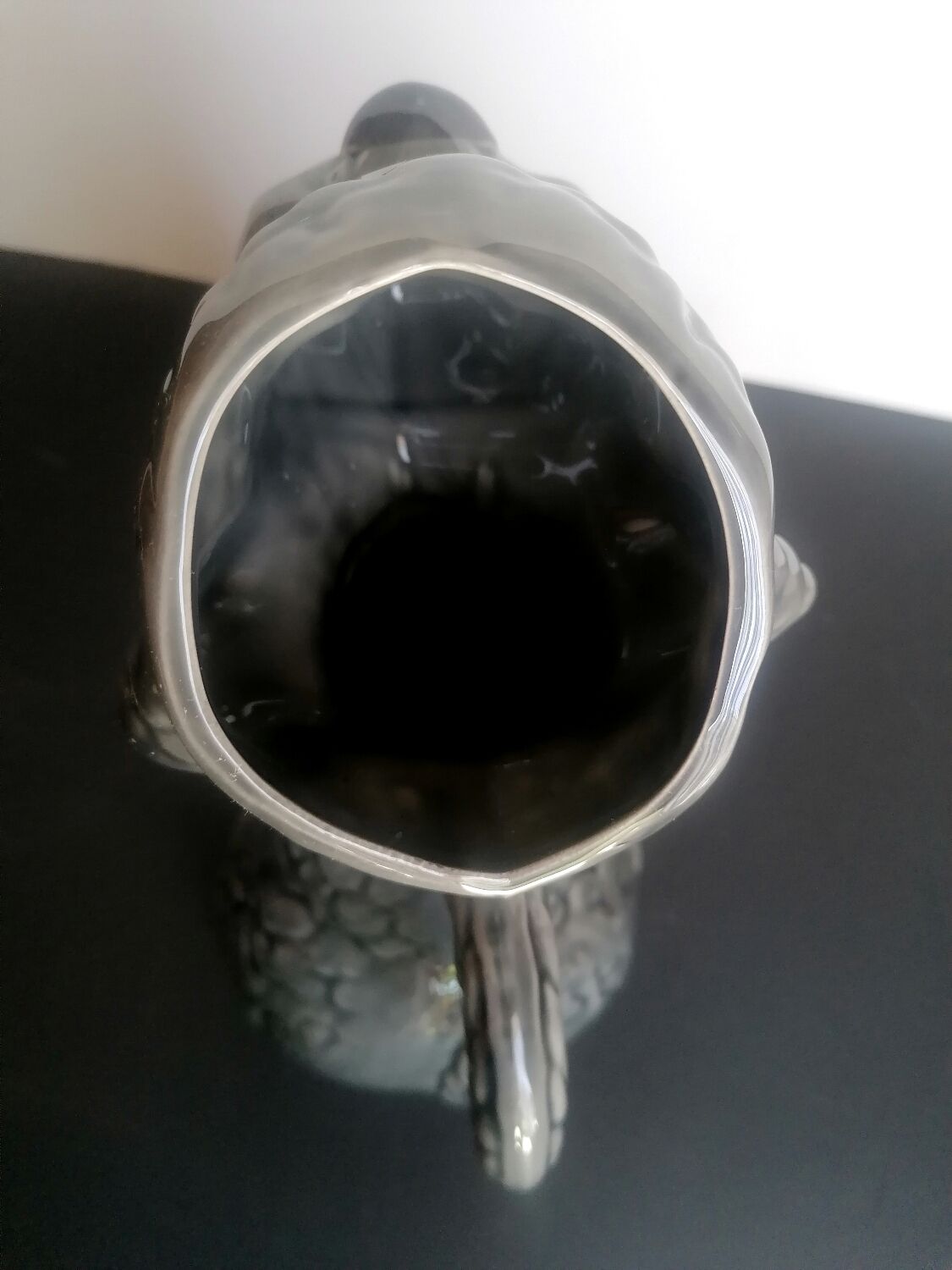 Zoomorphic pitcher slurry poodle