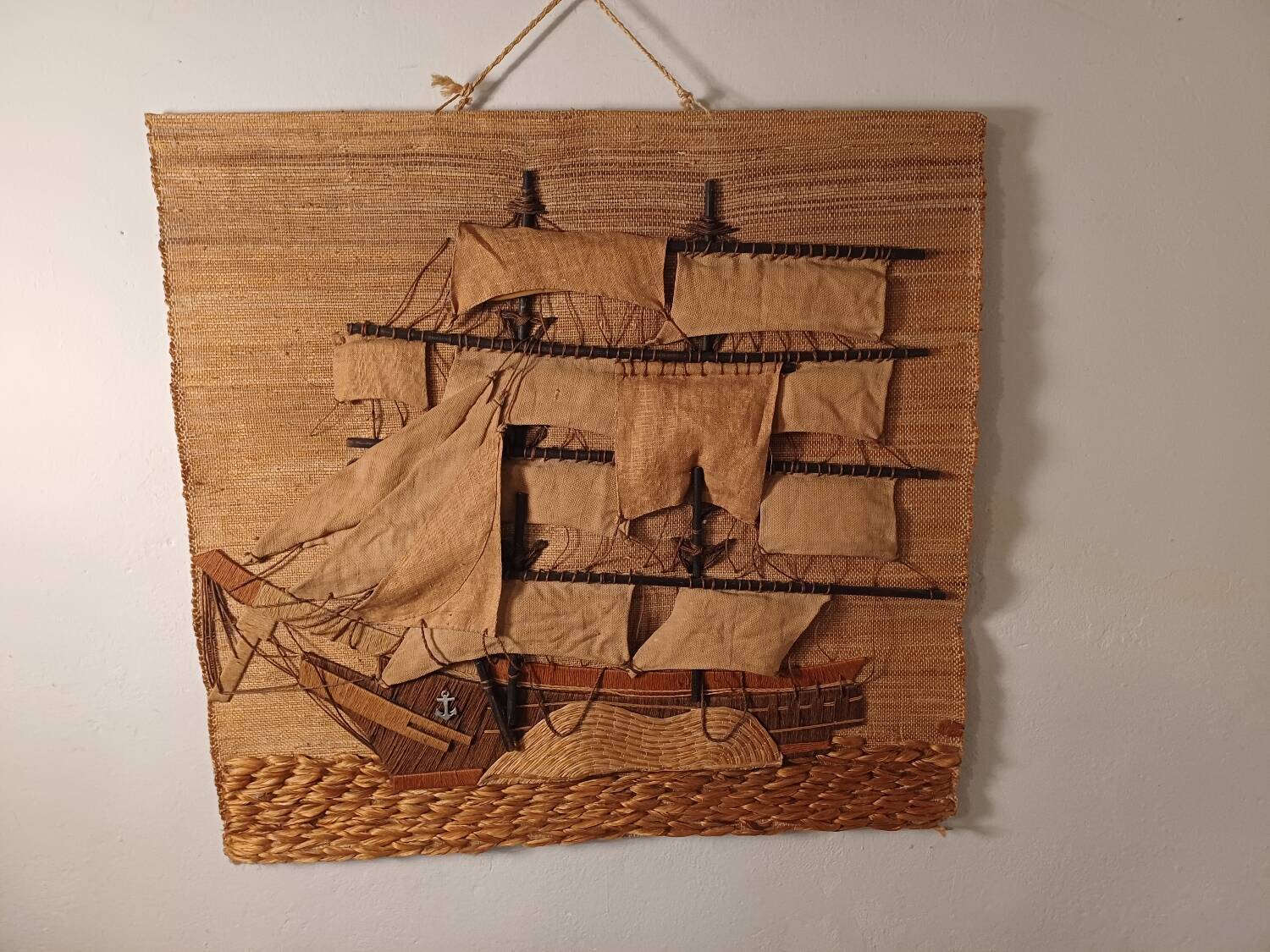 Vintage tapestry with a boat motif