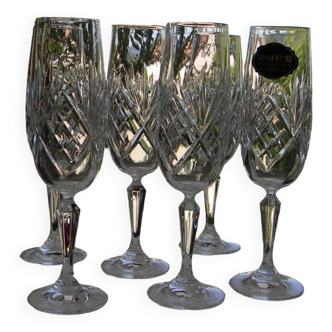 Set of 6 etzel bitche crystal champagne flutes.