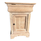 Raw wood bedside table