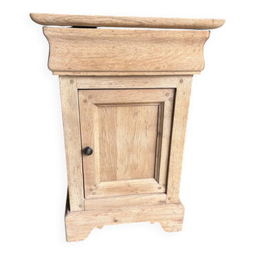 Raw wood bedside table