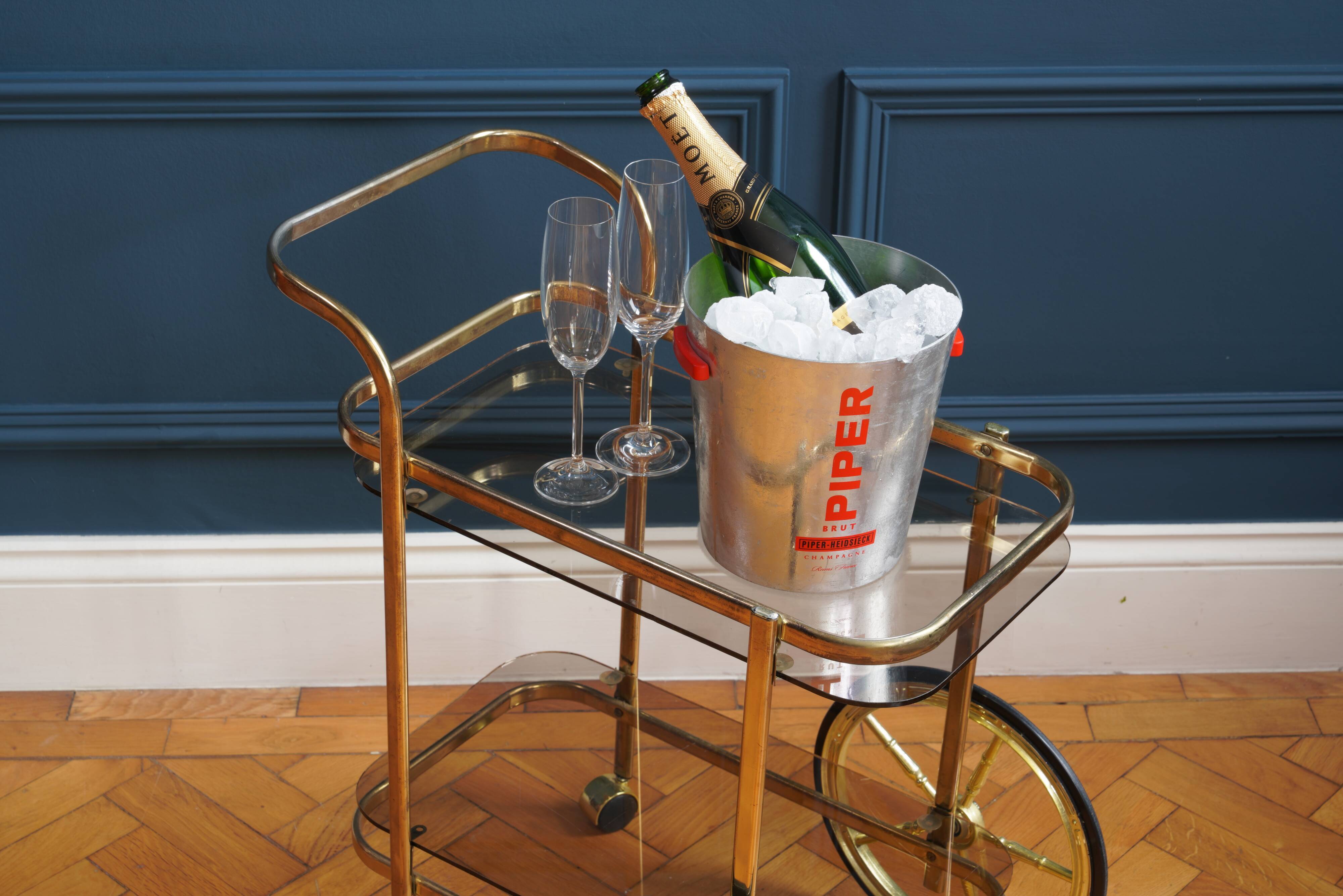 Brass wheeled bar cart
