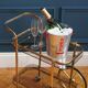 Brass wheeled bar cart
