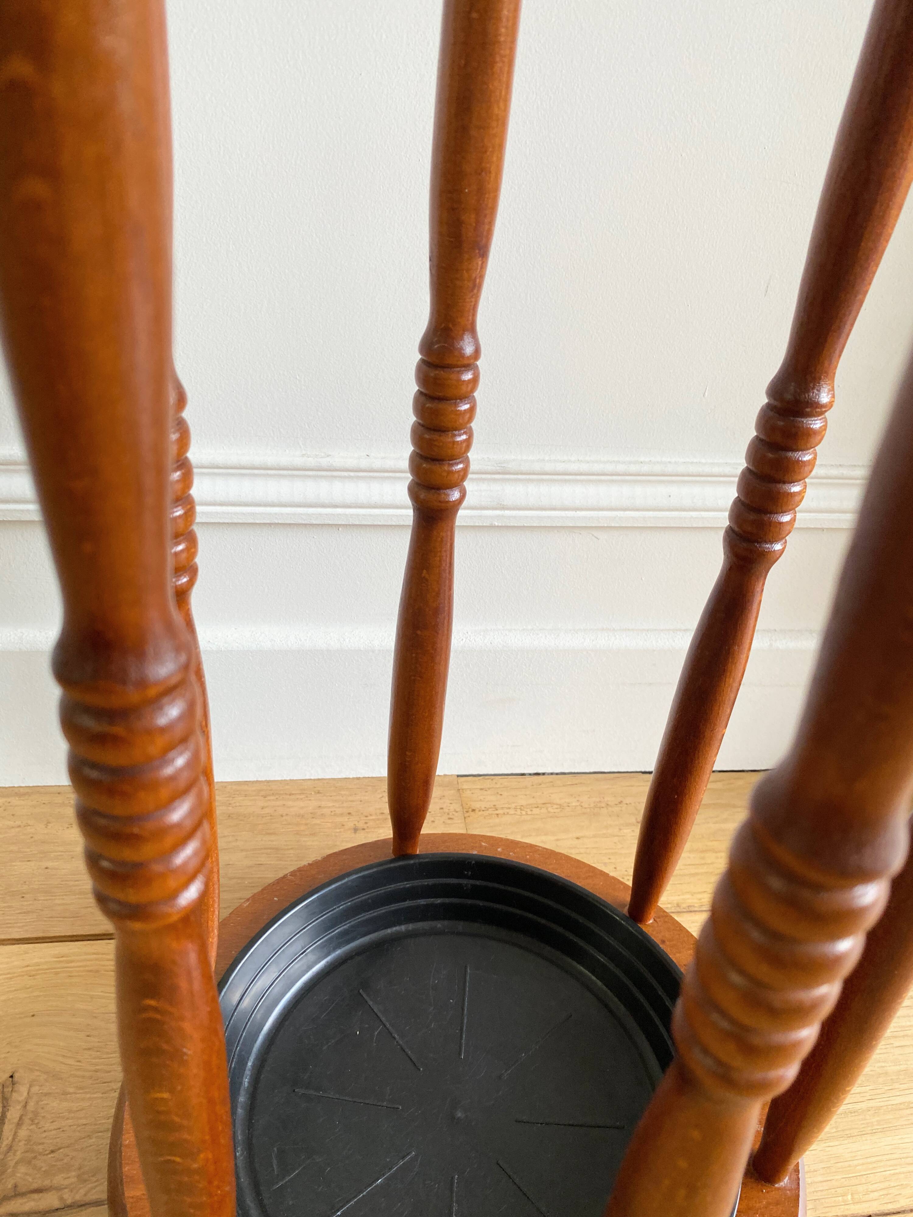 Vintage round wooden umbrella stand