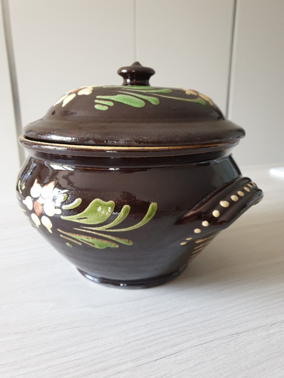 Large glazed terracotta covered pot