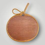 Vintage bamboo and rattan apple-shaped mirror - 1970s