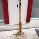 Floor lamp with vintage rattan coat rack