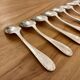 Set of 10 small silver metal spoons