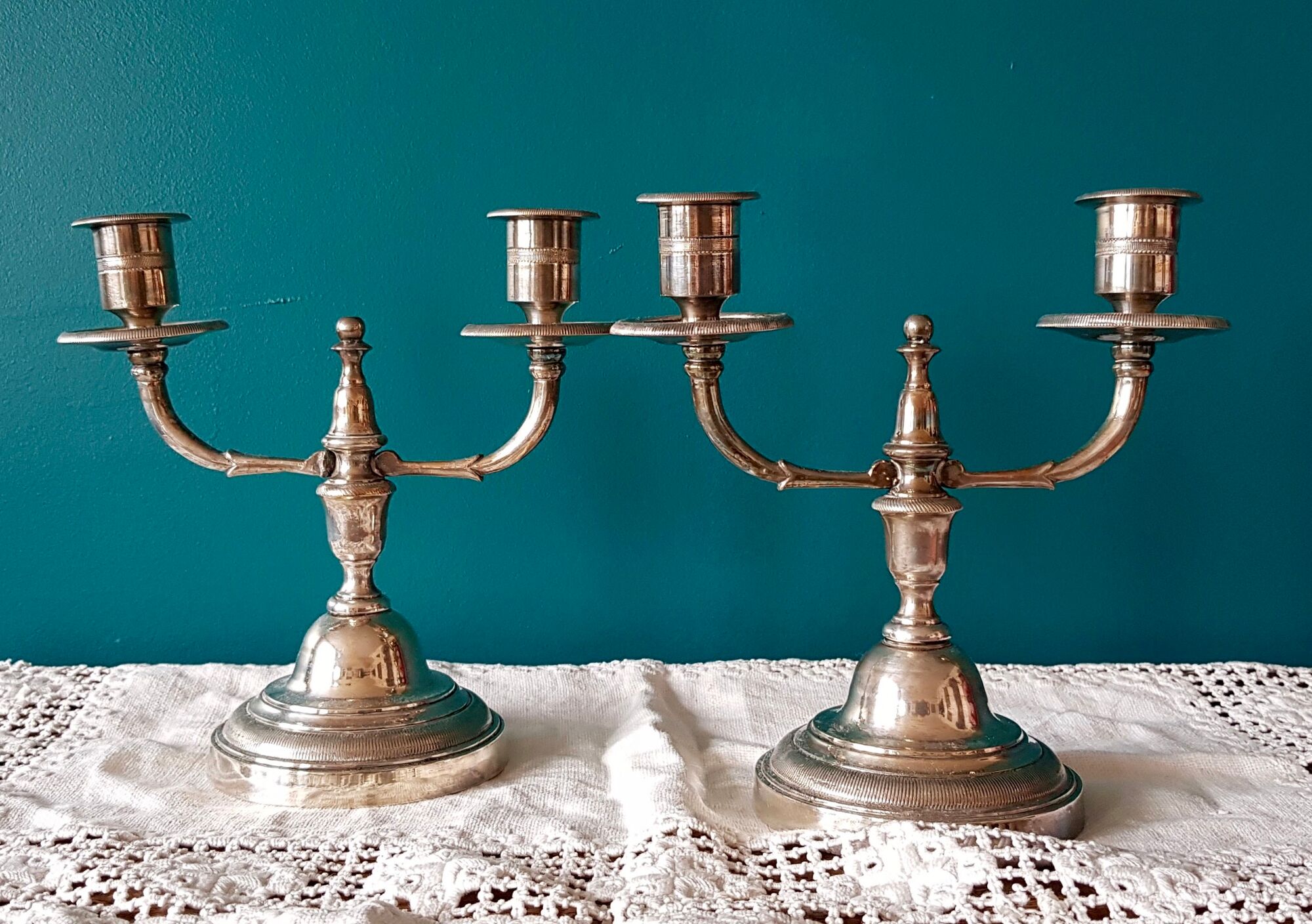 Pair of old silver metal candlesticks