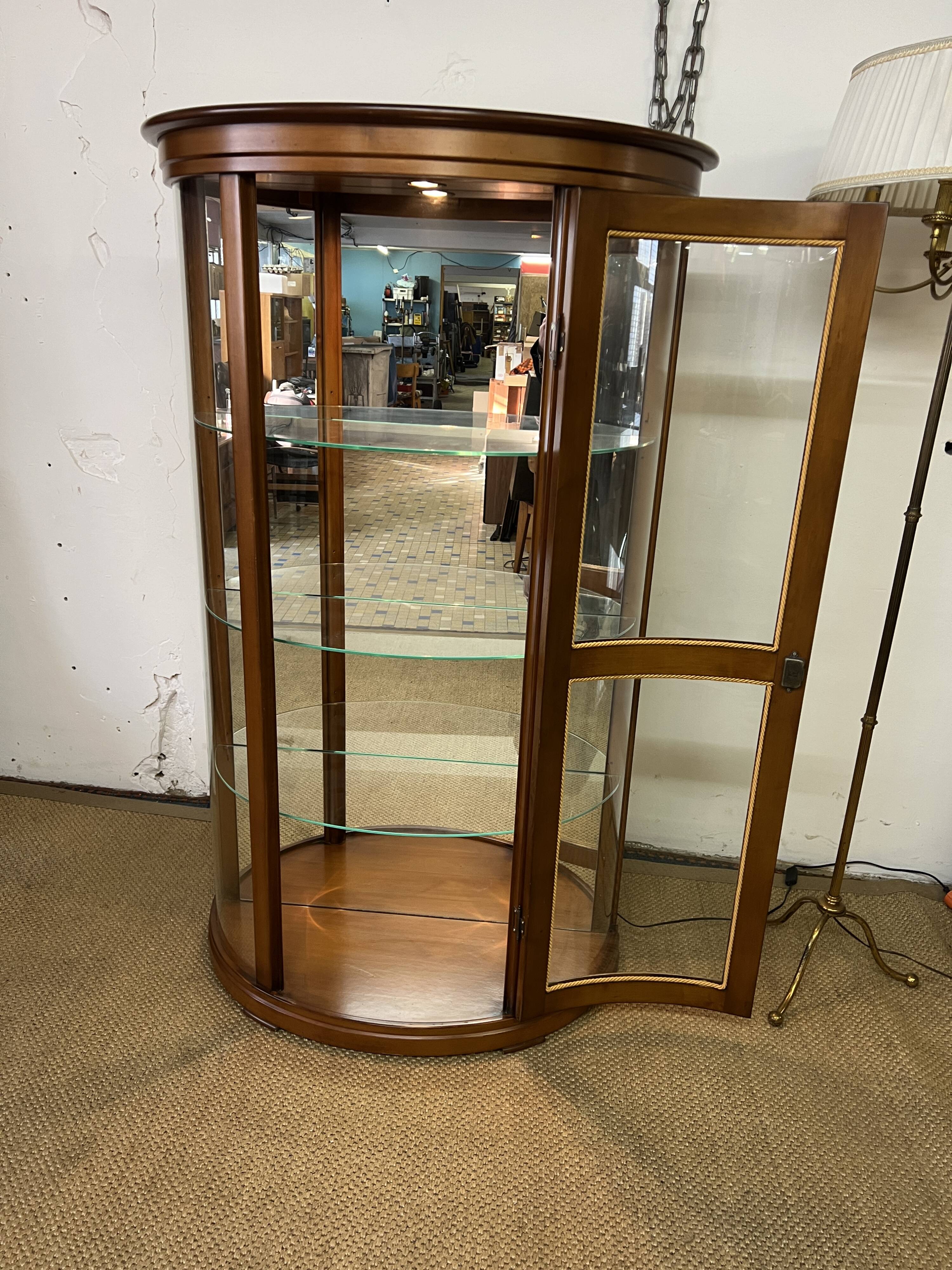 Wooden display case and half-moon mirror