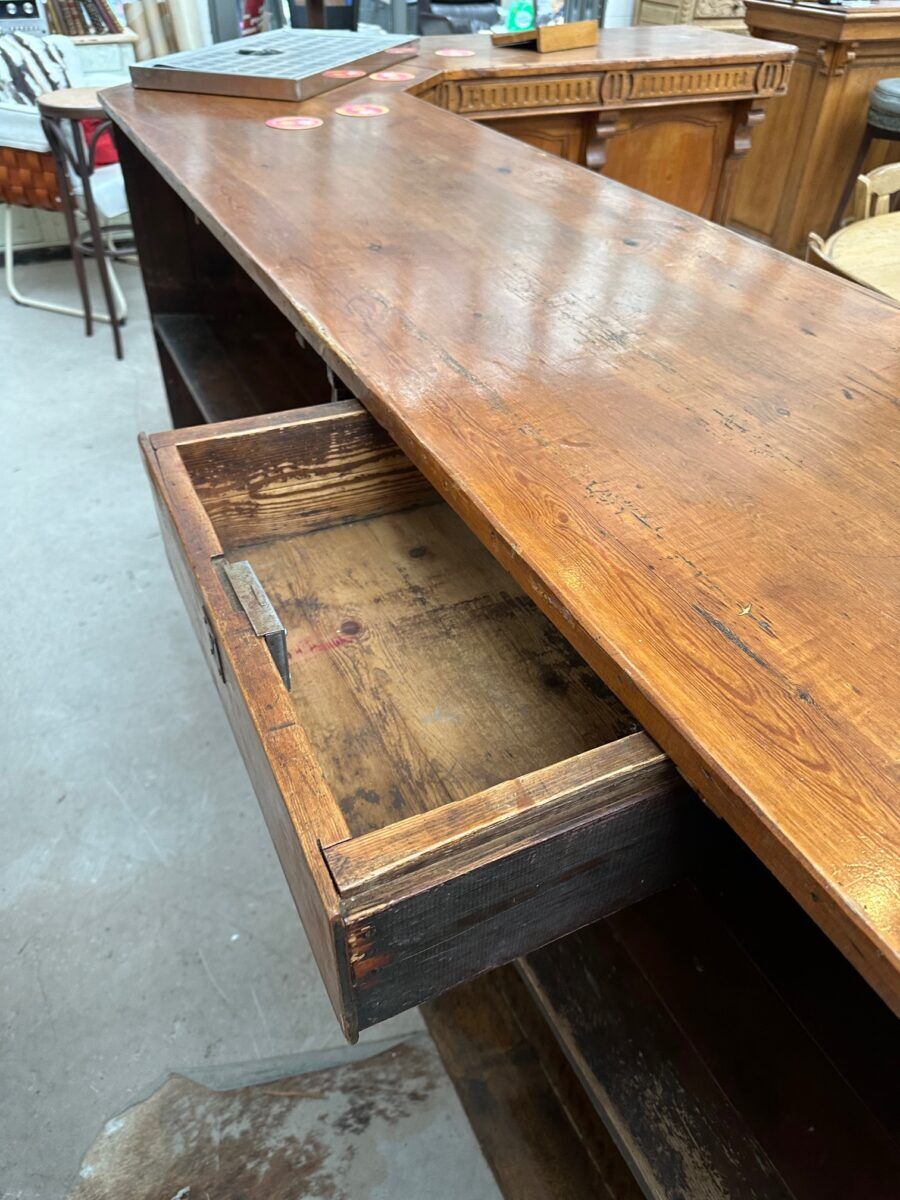 Large corner bar counter from the late 19th century.
