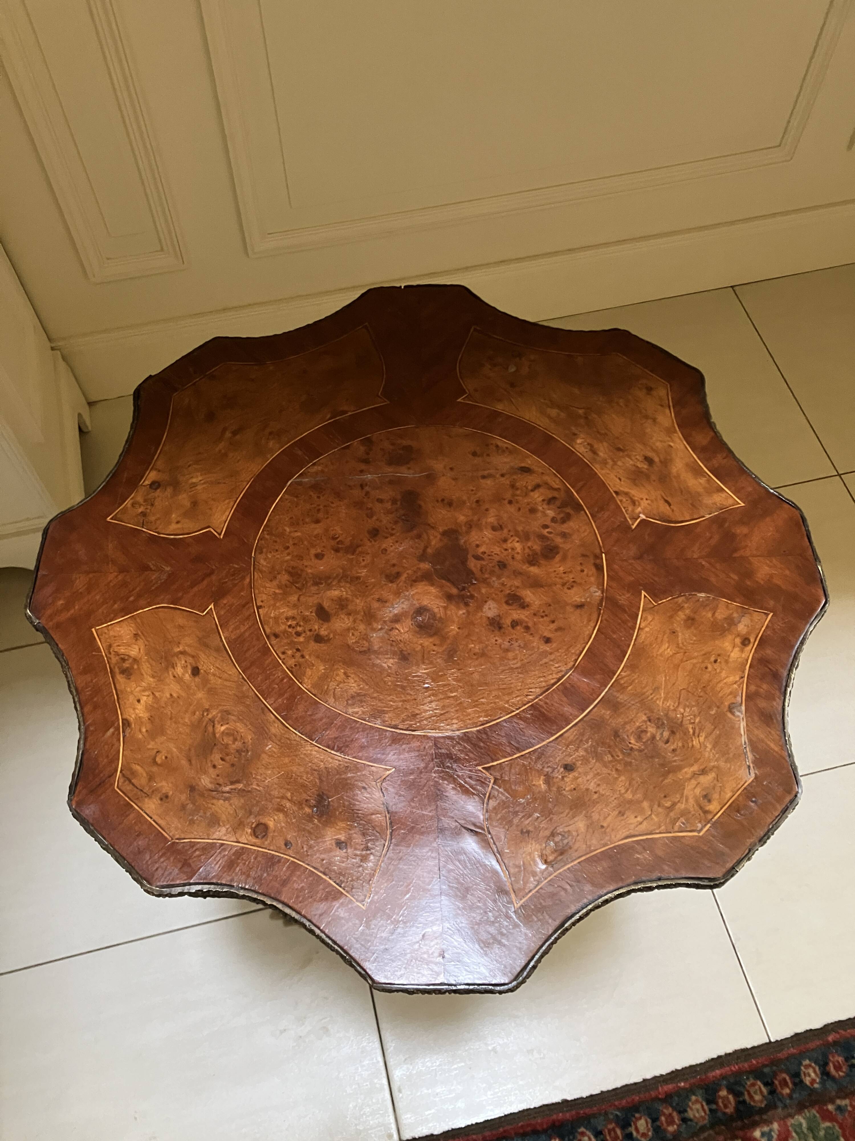 Marquetry pedestal table from the end of the 19th century