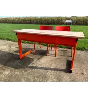 Vintage orange double school desk with its 2 matching chairs.