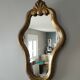 old mirror in gilded wood