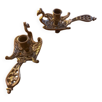 Paire de bougeoirs en bronze modèle au paon