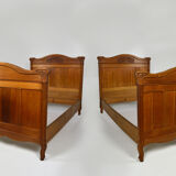 Art Nouveau twin beds in carved solid oak, France, circa 1910