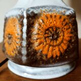 Ceramic lamp with sun patterns