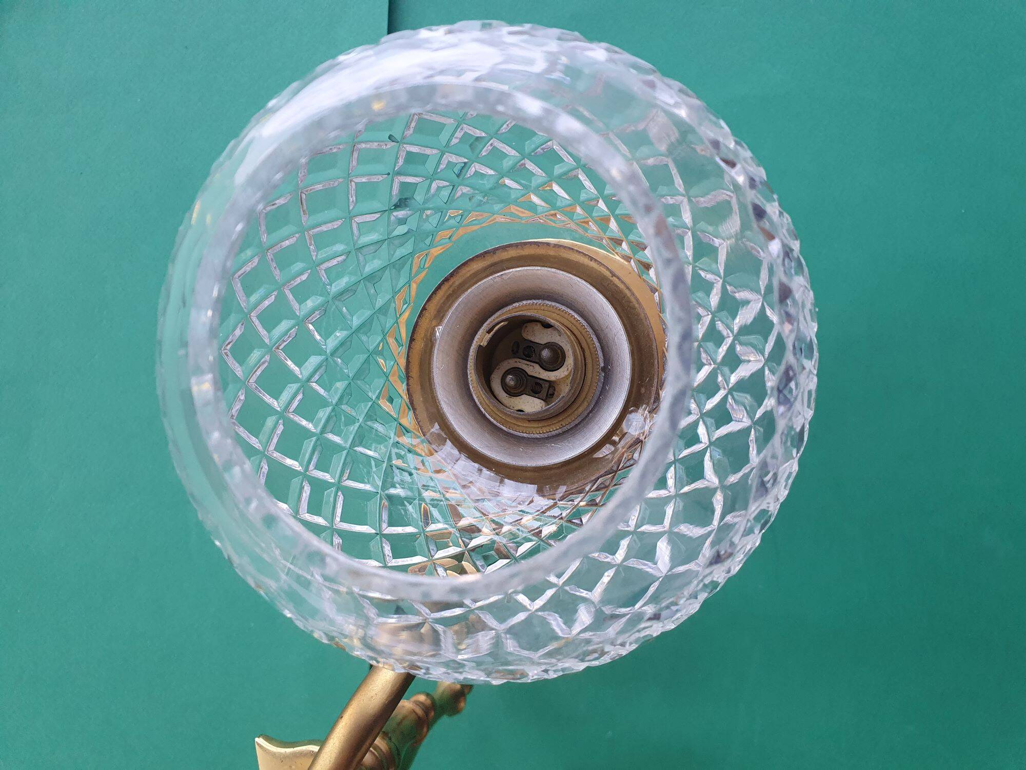 Two-light wall light gold with antique crystal globes