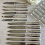 12 antique Christofle knives.